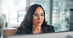 Research, glasses or businesswoman on computer in office for online report, taxes or audit. Night, review and banker reading on desktop in financial agency for banking, budget or investment growth
