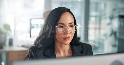 Buy stock photo Research, glasses or businesswoman on computer in office for online report, taxes or audit. Night, review and banker reading on desktop in financial agency for banking, budget or investment growth