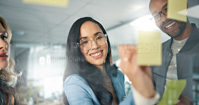 Buy stock photo Woman, writing and sticky note with team, glass board for project ideas and agenda schedule. Collaboration, problem solving and colleagues in business discussion for brainstorming meeting in office
