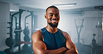 Portrait, fitness and confident black man in gym for exercise, muscle or strength training for health. Smile, wellness and person at workout club with bodybuilder for sports, trainer and arms crossed