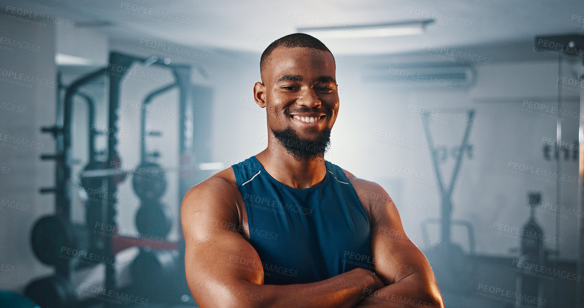 Buy stock photo Portrait, fitness and confident black man in gym for exercise, muscle or strength training for health. Smile, wellness and person at workout club as bodybuilder for sports, trainer and arms crossed