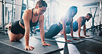 Fitness, exercise and push ups with personal trainer, class and gym for training or workout routine. Coaching, goals and target with group of sports people in health club together for core muscle