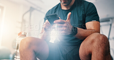 Buy stock photo Fitness, hands and man with phone on break to chat on social media, health app or gym blog. Bodybuilding tips, research or athlete with mobile technology reading workout plan for training or exercise