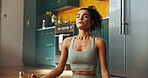 Woman, yoga and lotus on floor in kitchen, home or eyes closed for breathing exercise in morning for balance. Person, girl and meditation with mudra, zen or mindfulness with peace on mat at apartment