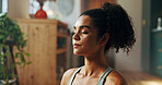 Balance, meditation and yoga with woman in kitchen of home for health, holistic routine or inner peace. Awareness, chakra and stress relief with yogi person on floor in apartment for mindfulness
