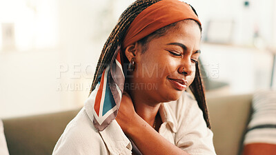 Buy stock photo Fatigue, injury and shoulder pain with woman on sofa in living room of home for break or recovery. Accident, inflammation and sore muscle with person in apartment to massage joint for relief