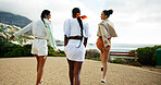 Vacation, back view and friends laughing outdoor for travel, summer trip and skipping on tropical island together. Happy group, tourism and women at ocean for funny joke, walk or jump on adventure