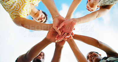 Buy stock photo Friends, hands stack and low angle with sky, smile and support with motivation, diversity and cheers. People, group and happy with celebration, reunion and excited in nature, outdoor and vacation