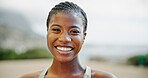 Portrait, outdoor and black woman with smile, fitness and challenge with exercise, progress and confidence. African person, face and runner in street, training for marathon and practice with wellness