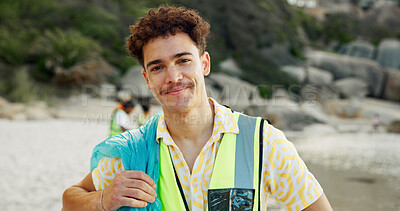 Buy stock photo Cleaning, portrait and recycling with man on beach for community service or conservation. Charity, earth and smile of volunteer outdoor on coast for activism, social responsibility or sustainability
