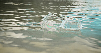 Buy stock photo Plastic, ocean and dirt with pollution for recycling, climate change or global warming in nature. Empty, sea or rubbish with reusable container or mess in water for waste management or contamination