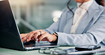 Woman, typing and hands on laptop for business, company report or financial review in workplace. Office, accountant and computer in firm for email draft, loan application or feedback on agency survey