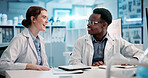 Smile, scientist and team talk in lab for medical breakthrough, innovation or solution. Planning, science research and collaboration with people for chemistry experiment, test or development at night