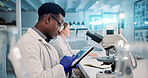 Biology, man or scientist on tablet to study in lab for medical research, discovery or genes innovation, Microscope, science or biologist with pharmaceutical report or futuristic genetic development