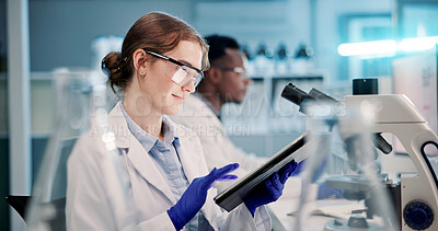 Buy stock photo Scientist, woman and tablet with research in laboratory for medical study, clinical trial and data analysis. Science, person and pharmaceutical app for genes innovation, genetic development or report