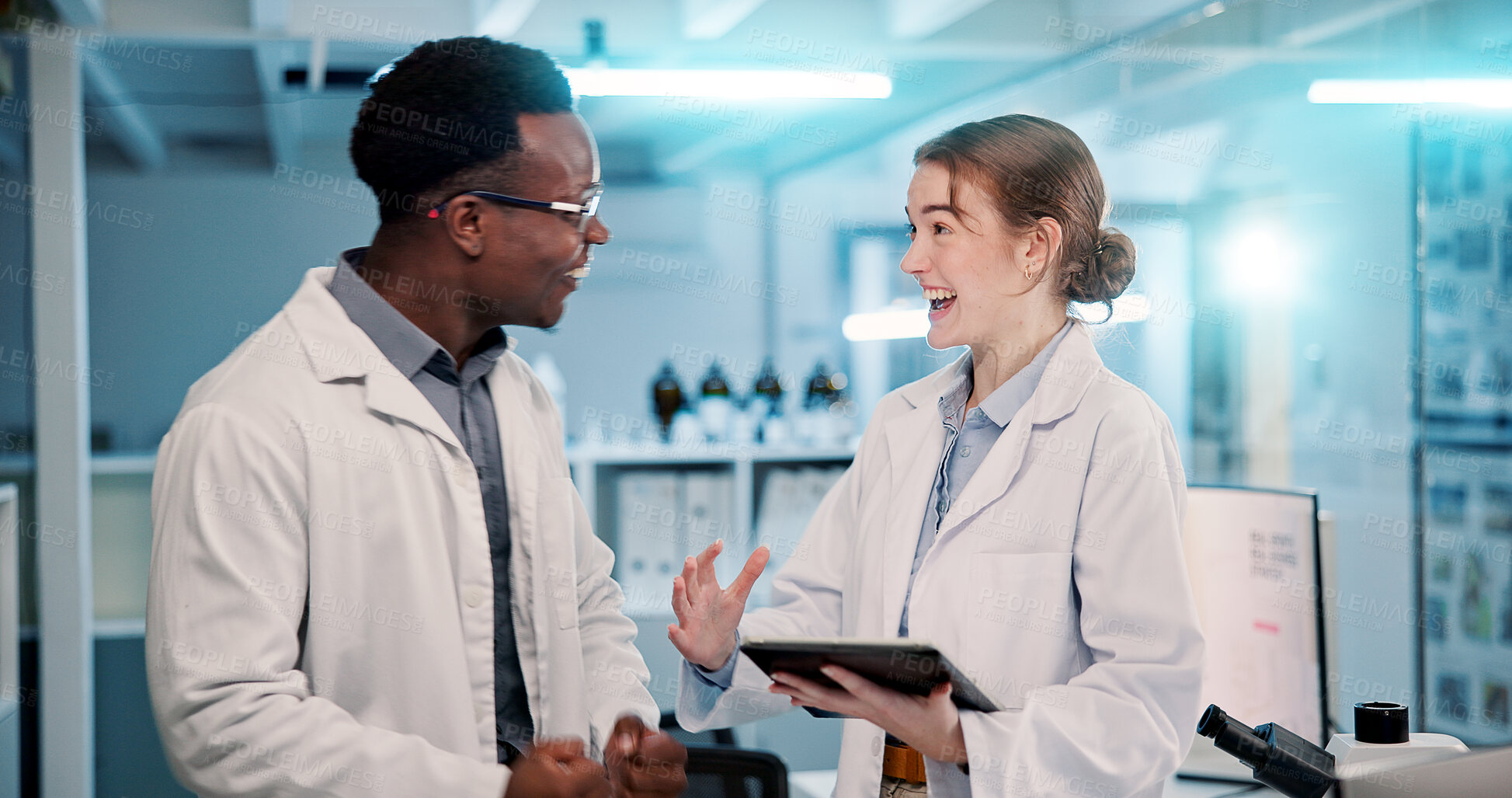 Buy stock photo Excited, science team and research in lab for medical breakthrough, innovation or solution. Scientist, tablet or collaboration with people for chemistry experiment, discussion or development at night