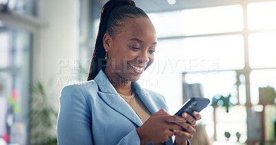 Buy stock photo Business, woman and typing with phone in office for text message, reading email and checking notifications. Black person, happy and smartphone at creative agency for research and social media scroll