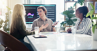 Buy stock photo People, phone and discussion in meeting for presentation of application with software, inventors and clients. Man, smartphone and pitch business plan with proposal, vision and music app development