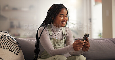 Buy stock photo Home, relax and woman on sofa, cellphone or typing with smile, social media or connection. Apartment, funny meme or black person on couch, smartphone or digital app for message to contact or internet