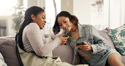 Buy stock photo Texting, friends and women with smartphone, sofa and bonding for gossip on social media or relax. Message, smile and people with mobile for post in living room, online or girls with tech in house