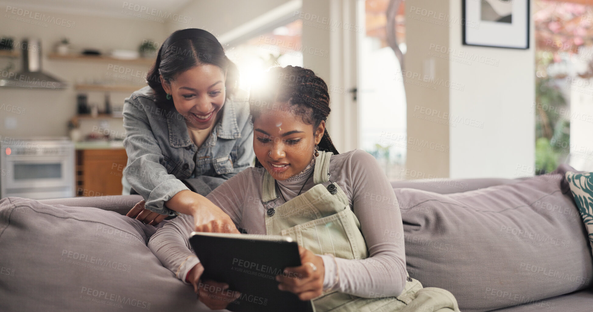 Buy stock photo Happy, choice and friends with tablet, home and women with smile for movie, living room and pointing. House, girls and people with tech for entertainment, bonding and decision for movies in lounge