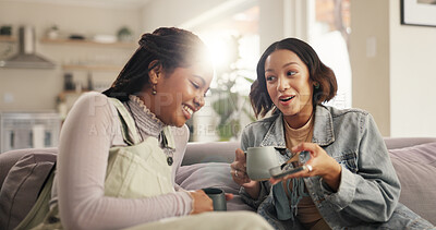 Buy stock photo Home, coffee and friends on sofa, smartphone and texting with funny meme, talking and relax. People, apartment and women on couch, espresso and cellphone for message, online humor and conversation