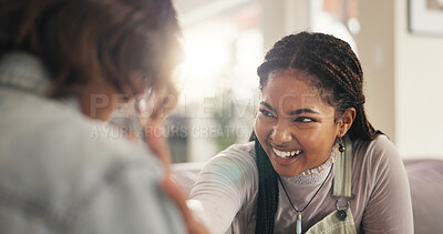 Buy stock photo Bonding, joke and smile with women on sofa in living room of home together for reunion or visit. Conversation, laughing and relax with funny friends in apartment for gossip or relationship on weekend