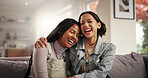 Hug, laugh and relax with friends on sofa for reunion, bonding and happiness. Funny conversation, love and support with women and embrace in living room at home for trust, communication and care