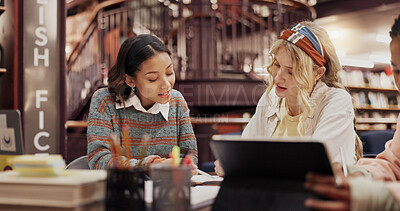 Buy stock photo Students, women and notes with discussion at library for group project, research or education at university. People, girl and review with problem solving, talk or learning for scholarship at college