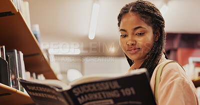 Buy stock photo Black woman, reading and book as student in library for research, study marketing and career preparation. Person, textbook and information on business knowledge, education exam and university project