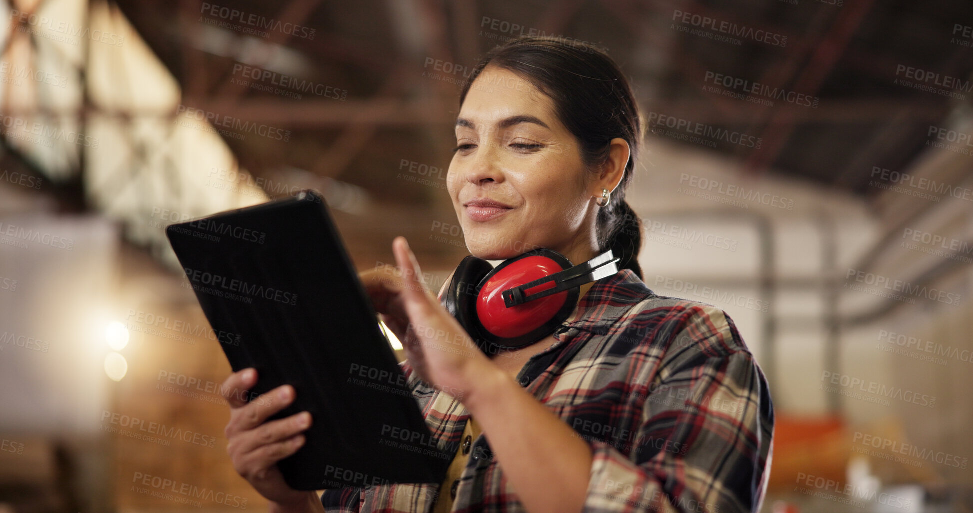 Buy stock photo Carpentry, workshop and business woman on tablet for online planning, schedule and inventory. Woodworking, factory and carpenter on digital tech for manufacturing, furniture and timber production
