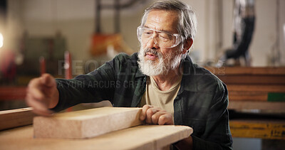 Buy stock photo Carpentry, measure and man with wood in workshop for furniture, building and lumber production. Construction, woodworking and mature carpenter for planks, timber and board for renovation in factory