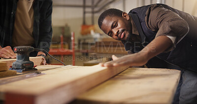 Buy stock photo Man, carpenter or wood with plank at warehouse for polish, craft or building project. Male person, woodworking and beam with sander for wooden repair, timber design or restoration at lumber workshop