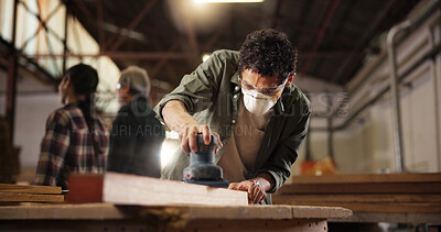 Buy stock photo Man, carpenter or wood with sanding machine at workshop for polish, craft or building project. Male person, woodworking and mask for wooden repair, design or restoration at construction warehouse