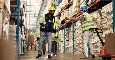 Buy stock photo Men, fist bump and teamwork at warehouse for logistics, clipboard and greeting by shelf, respect or inspection. People, happy and inventory for distribution, smile or supply chain at industrial plant