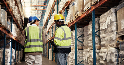 Buy stock photo Men, tablet and discussion at warehouse for logistics, schedule or review stats for stock, planning or inspection. People, partner and touchscreen for distribution, shipping or app with back at plant