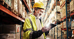 Logistics, shipping and man in warehouse, tablet and export with quality control. Mature person, employee and inspector in factory, inventory or check stock with manufacturing, email and supply chain