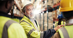 Logistics, colleagues and mature man in warehouse, discussion and collaboration for team with stock. Factory, boss and planning for distribution in business, supply chain and people in meeting