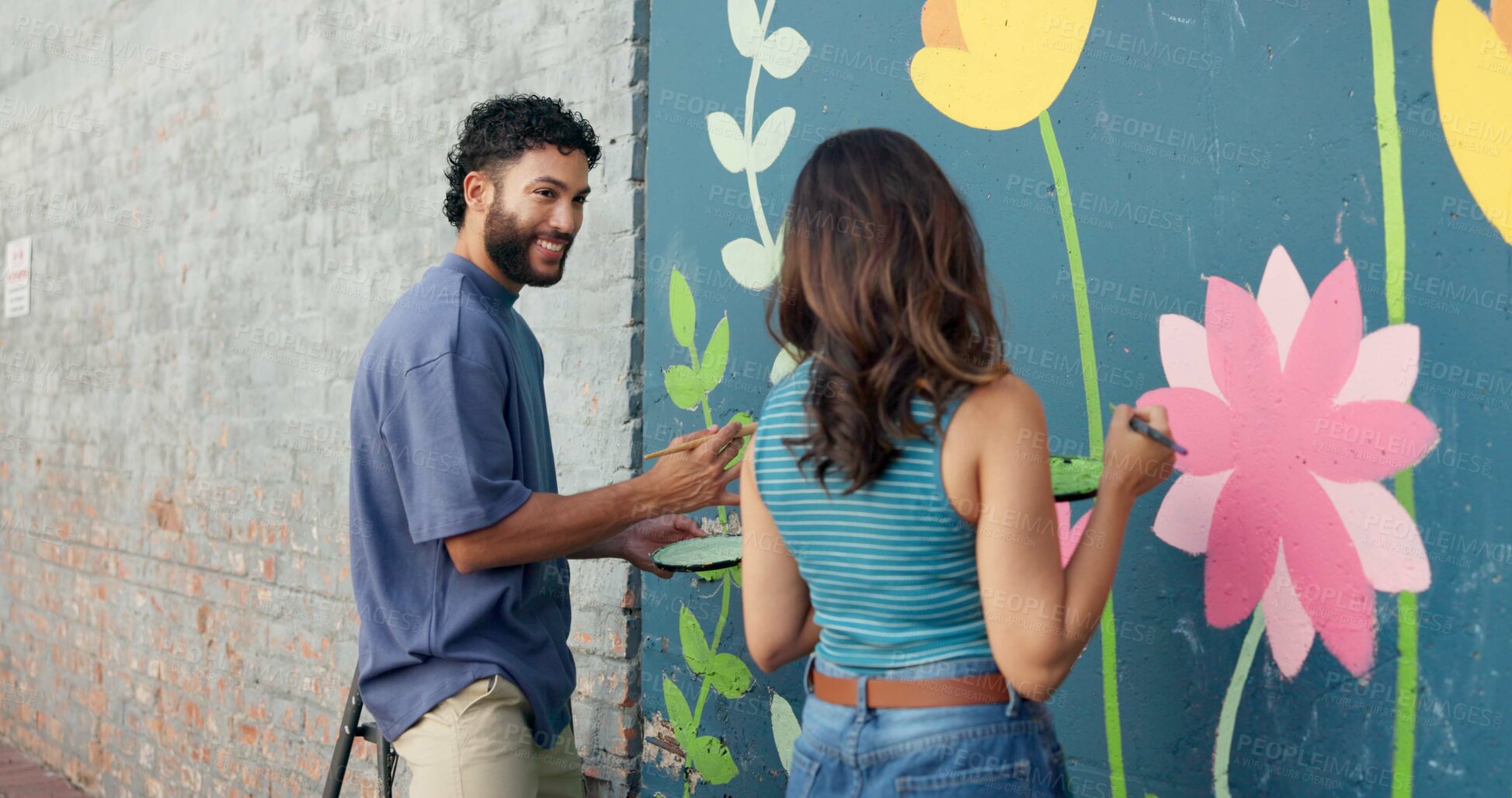 Buy stock photo Happy, couple and painting wall for art project, mural design and helping with creative development. Smile, people and  artist with hobby for community renovation, diy decoration and flower aesthetic