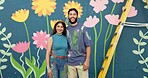 Mural, happy and portrait of couple by wall for painting, creative project and decoration outdoors. Art, smile and man and woman hug with inspiration for flowers, aesthetic and diy design together