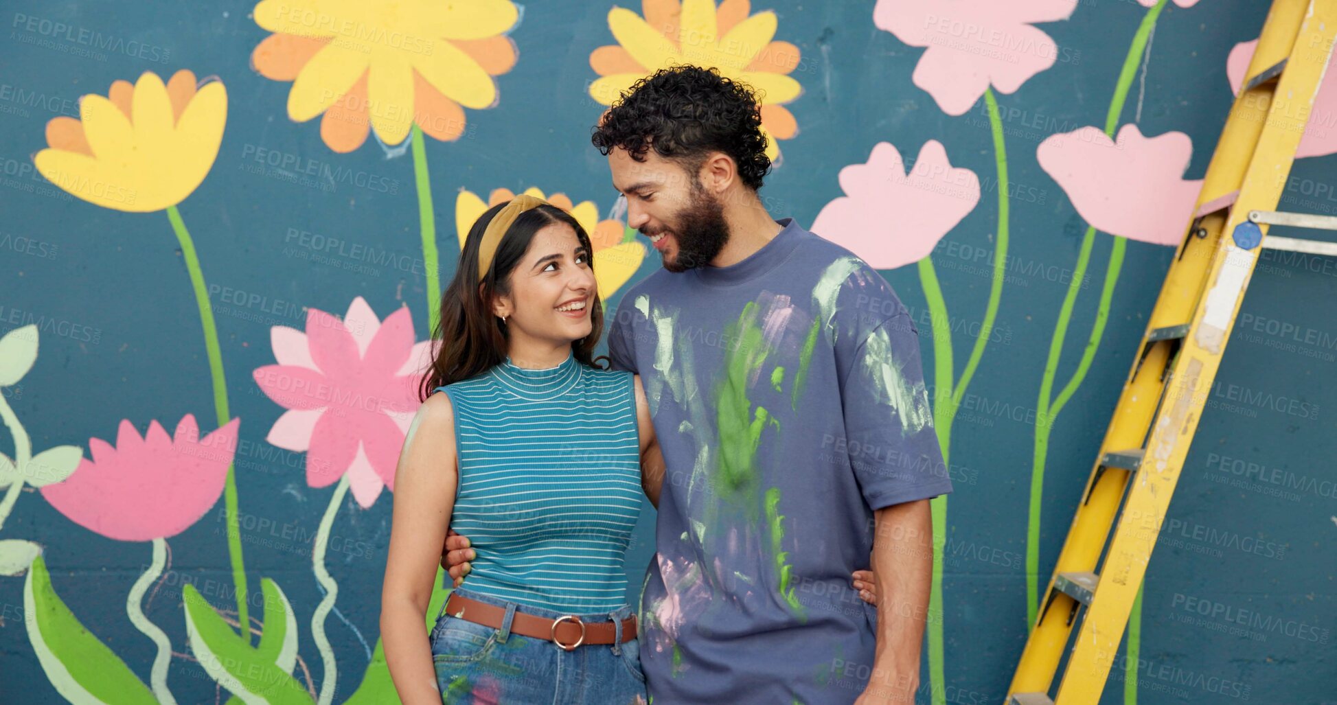 Buy stock photo Mural, happy and couple by wall for art project, creative painting and decoration outdoors. Renovation, smile and man and woman hug with inspiration for flowers, aesthetic and DIY design together