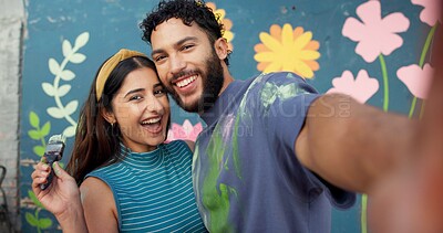 Buy stock photo Portrait, wall or selfie of couple with painting for art, decoration or creative project. Happy, smile and photo POV of man or woman by mural for profile picture, social media or memory with graffiti