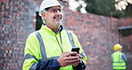 Phone, mature man and construction worker on site with contact for renovation approval. Contractor, industry and male civil engineer reading building, maintenance or repairs plan on cellphone.
