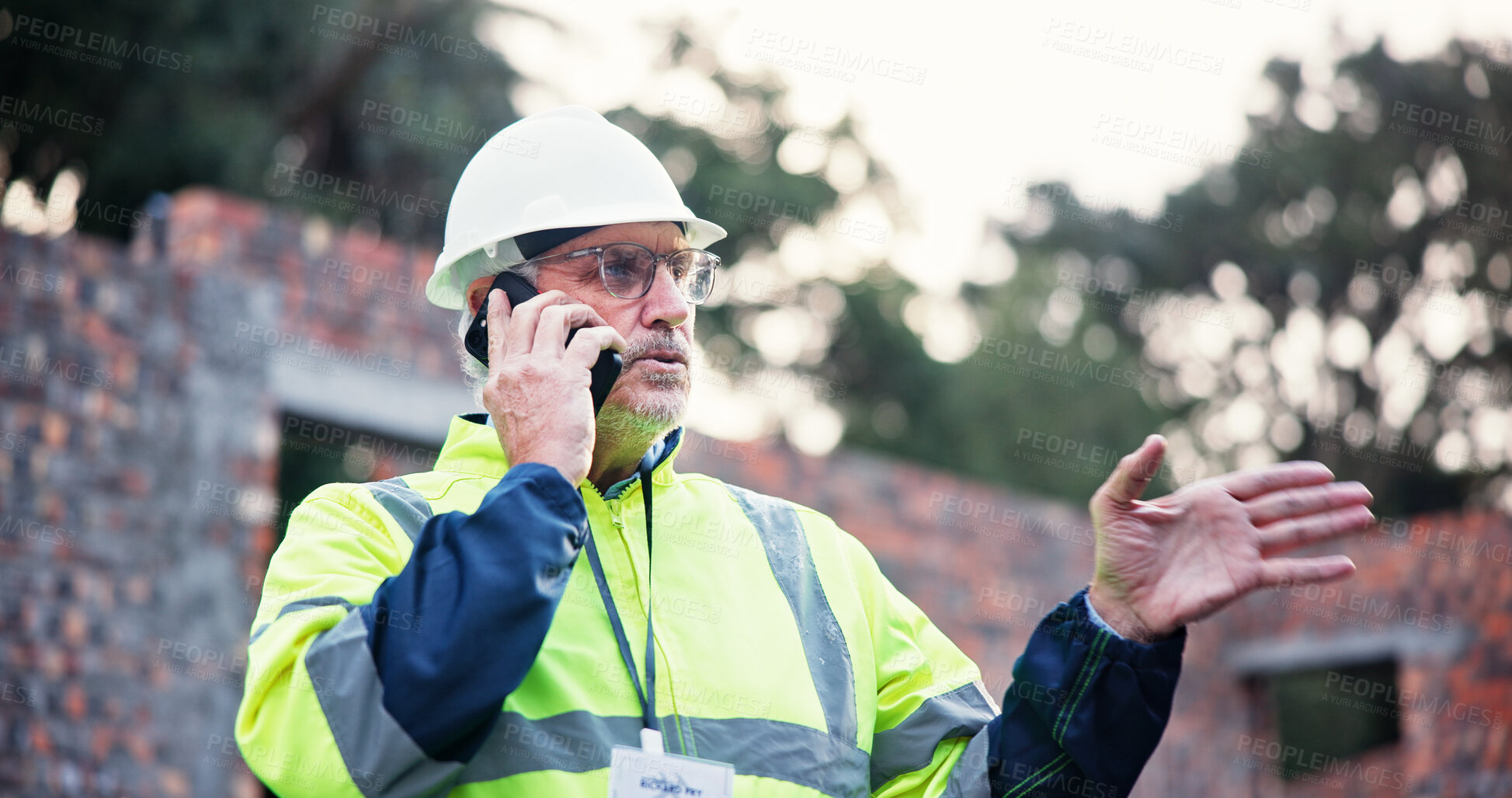 Buy stock photo Man, architect and talking with phone call for construction update, planning and feedback on project. Mature person, mobile and explain for urban development, maintenance progress and industrial chat