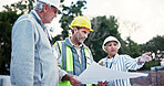 Business people, civil engineer or meeting with blueprint for construction plan at site. Group, employees or contractors with floor layout or documents for industrial development or building project