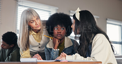 Buy stock photo Books, teacher and helping students in high school with lesson question, learning solution or assignment assistance. Educator, people and discussion for peer assessment or test knowledge in classroom