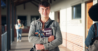 Buy stock photo Education, portrait and teenager smile with book in hallway for biology class, learning and study. Student, boy and happy at high school for bioscience knowledge, scholarship or development on campus