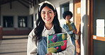 Education, teenager and smile with portrait of girl in hallway for high school academy, future and scholarship. Chemistry textbook, studying and learning with students on campus for knowledge