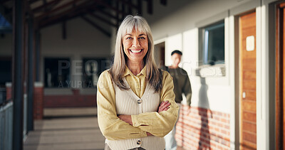 Buy stock photo Smile, woman and portrait of teacher at school for career in education, confidence and happiness. Professional, job and mature female educator with knowledge for teaching in hallway at campus academy