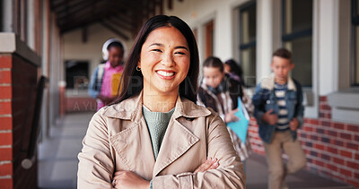 Buy stock photo Happy, woman and portrait of teacher in school with crossed arms for confidence in education career. Smile, professional and female educator in hallway at academy with pride for knowledge in job.